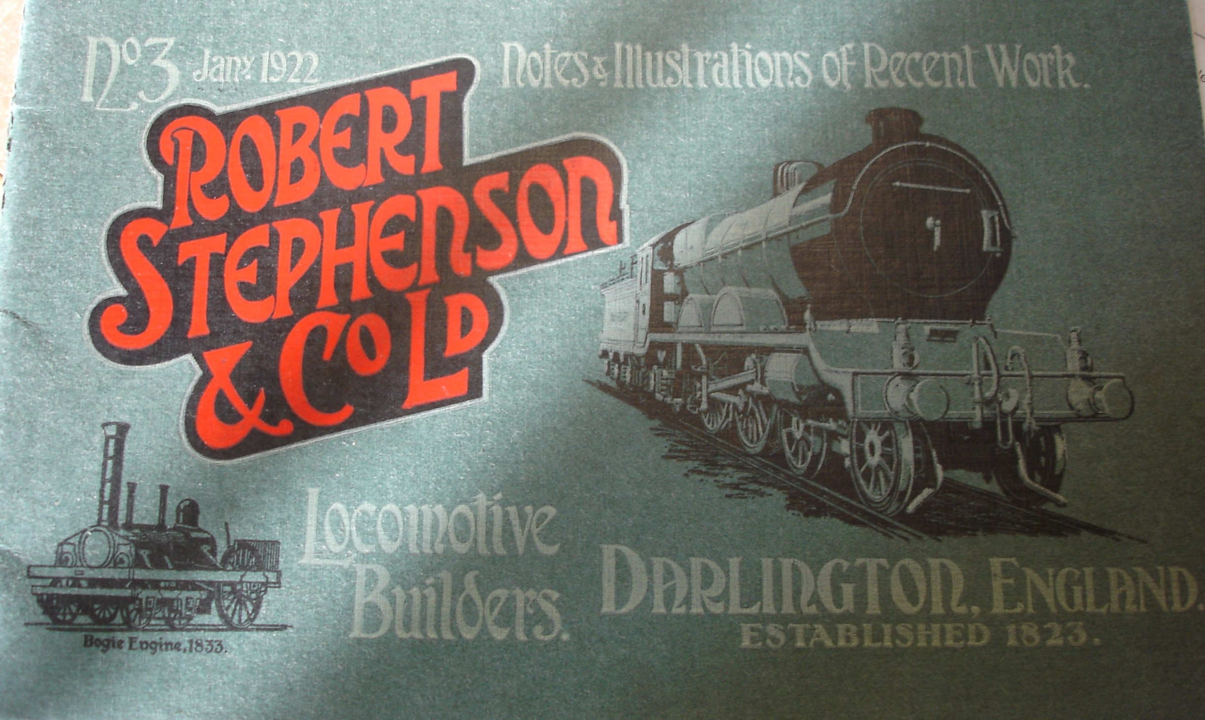 Grey brochure with red font and drawings of two locomotives.